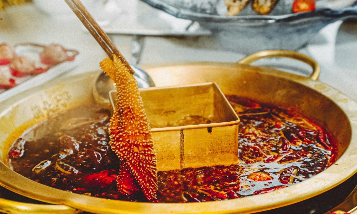 为什么四川地区吃火锅蘸油碟，北方更喜欢蘸麻酱？